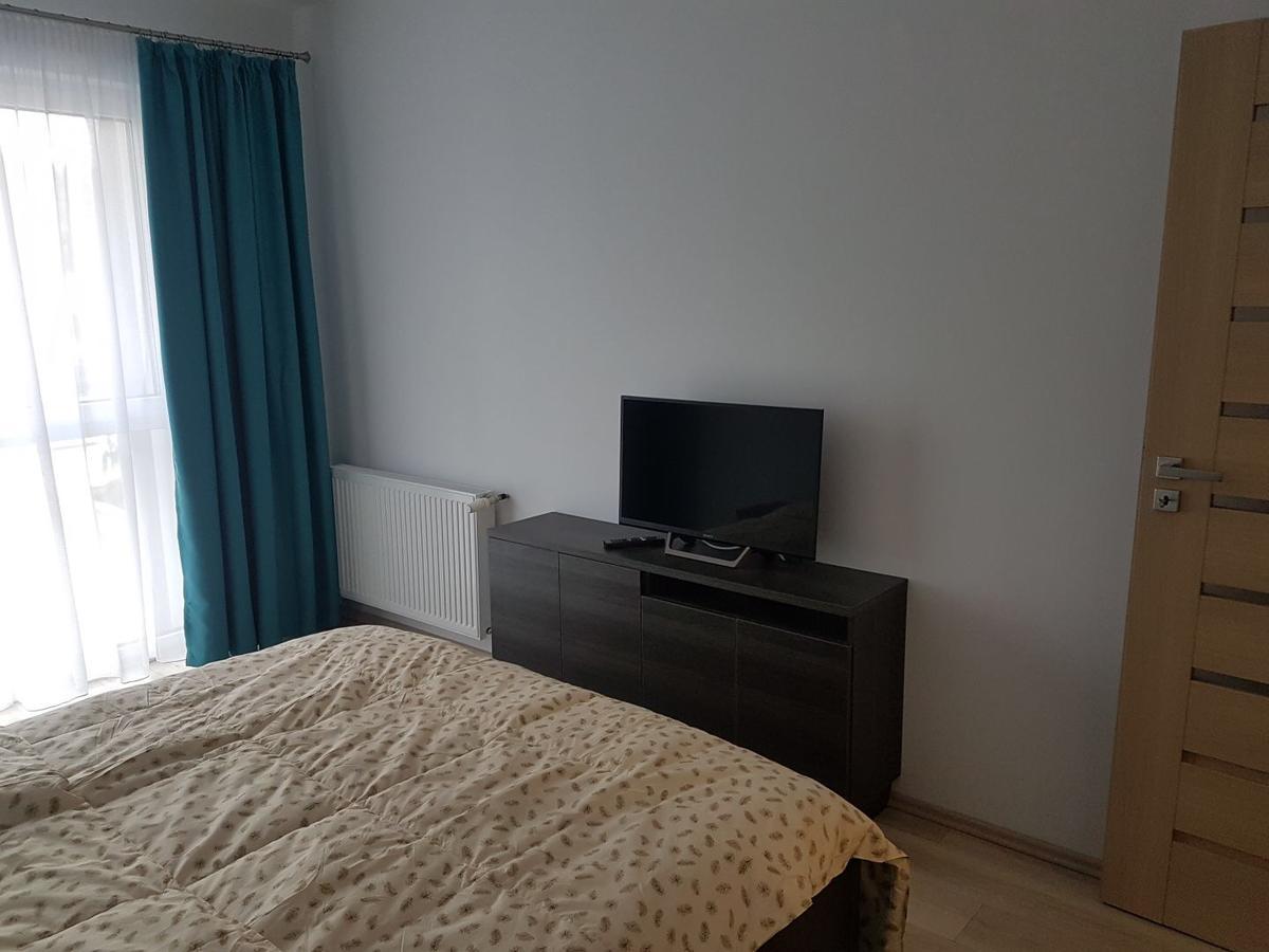 Hotel Platinia Cluj-Napoca Exterior foto A bedroom with a television
